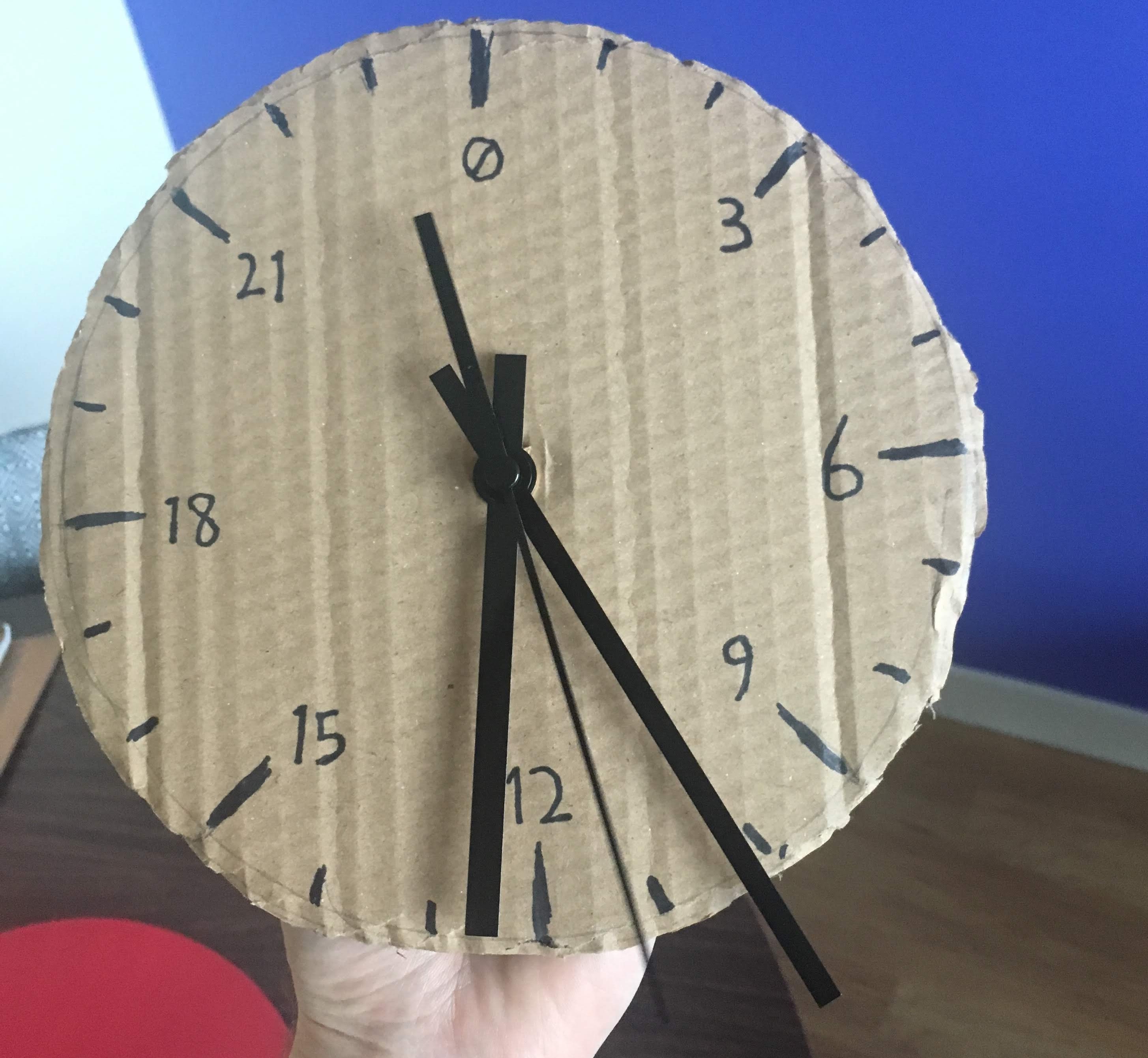 an ugly cardboard clock